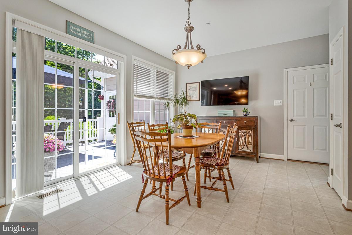 11565 Magnolia Court Issue, MD 20645 - Photo 20 of 68 a view of a dining room with furniture window and outside view