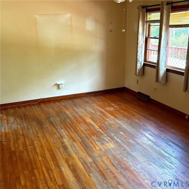 85 Frenchs Store Road Cumberland, VA 23040 - Photo 8 of 19 Hardwood flooring throughout, featuring baseboard