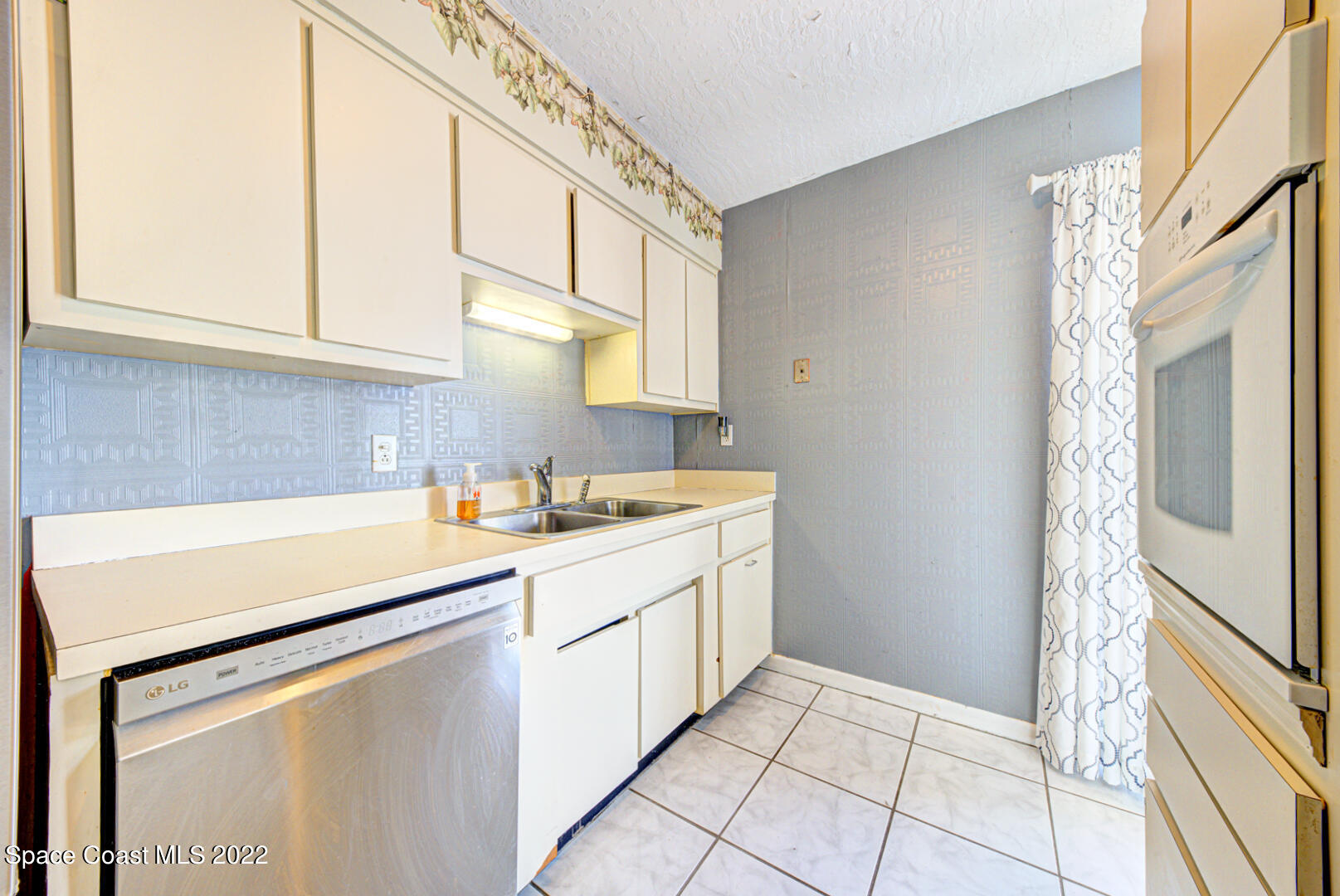620 Java Road Cocoa Beach, FL 32931 - Photo 13 of 39 kitchen with tile floor
