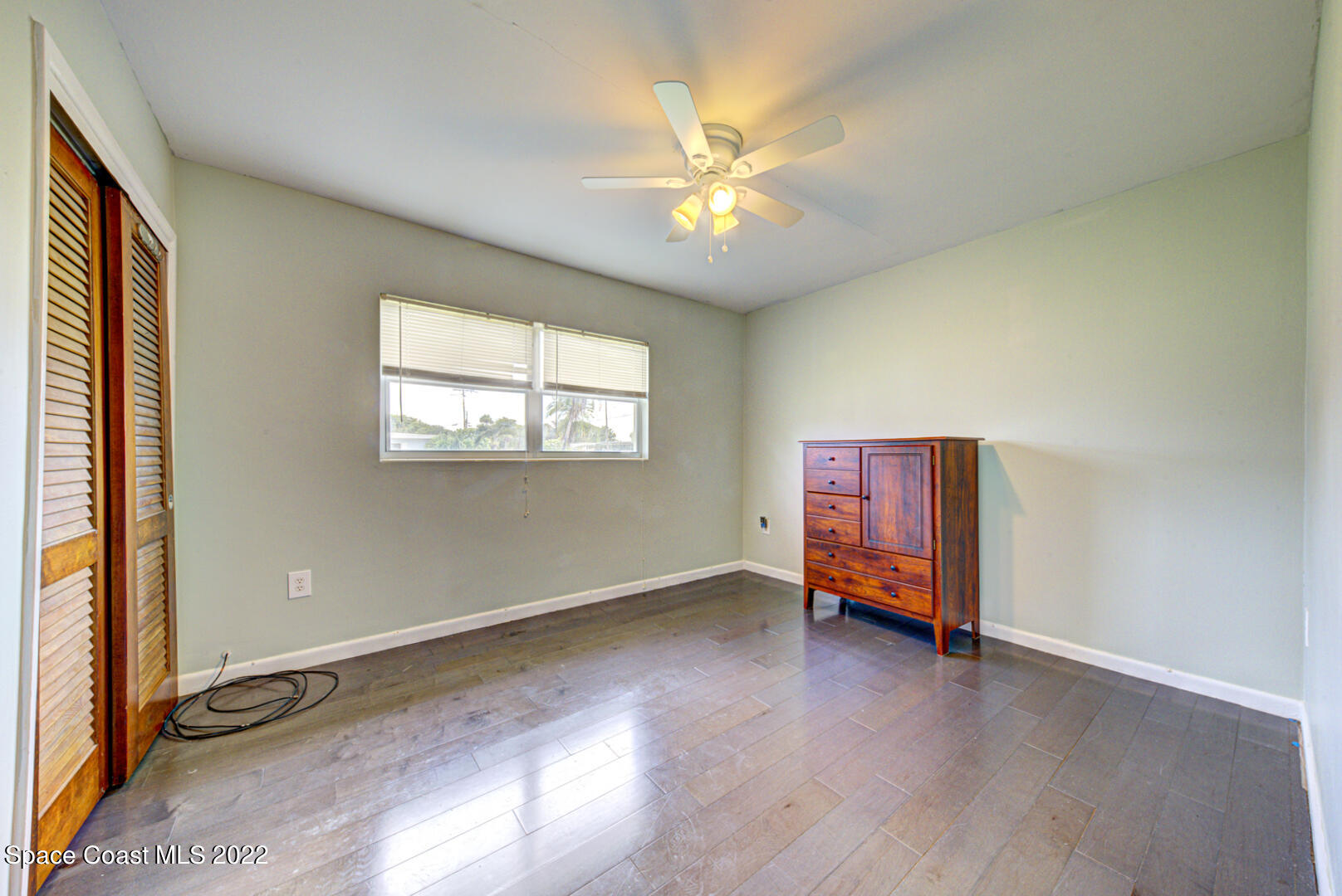 620 Java Road Cocoa Beach, FL 32931 - Photo 23 of 39 wooden floor in an empty room with a window