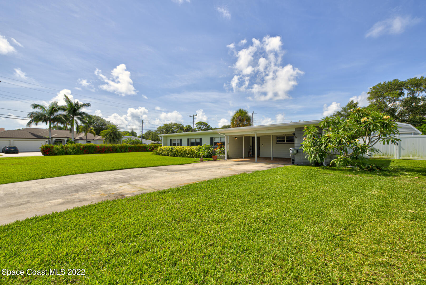 620 Java Road Cocoa Beach, FL 32931 - Photo 38 of 39 a front view of a house with garden
