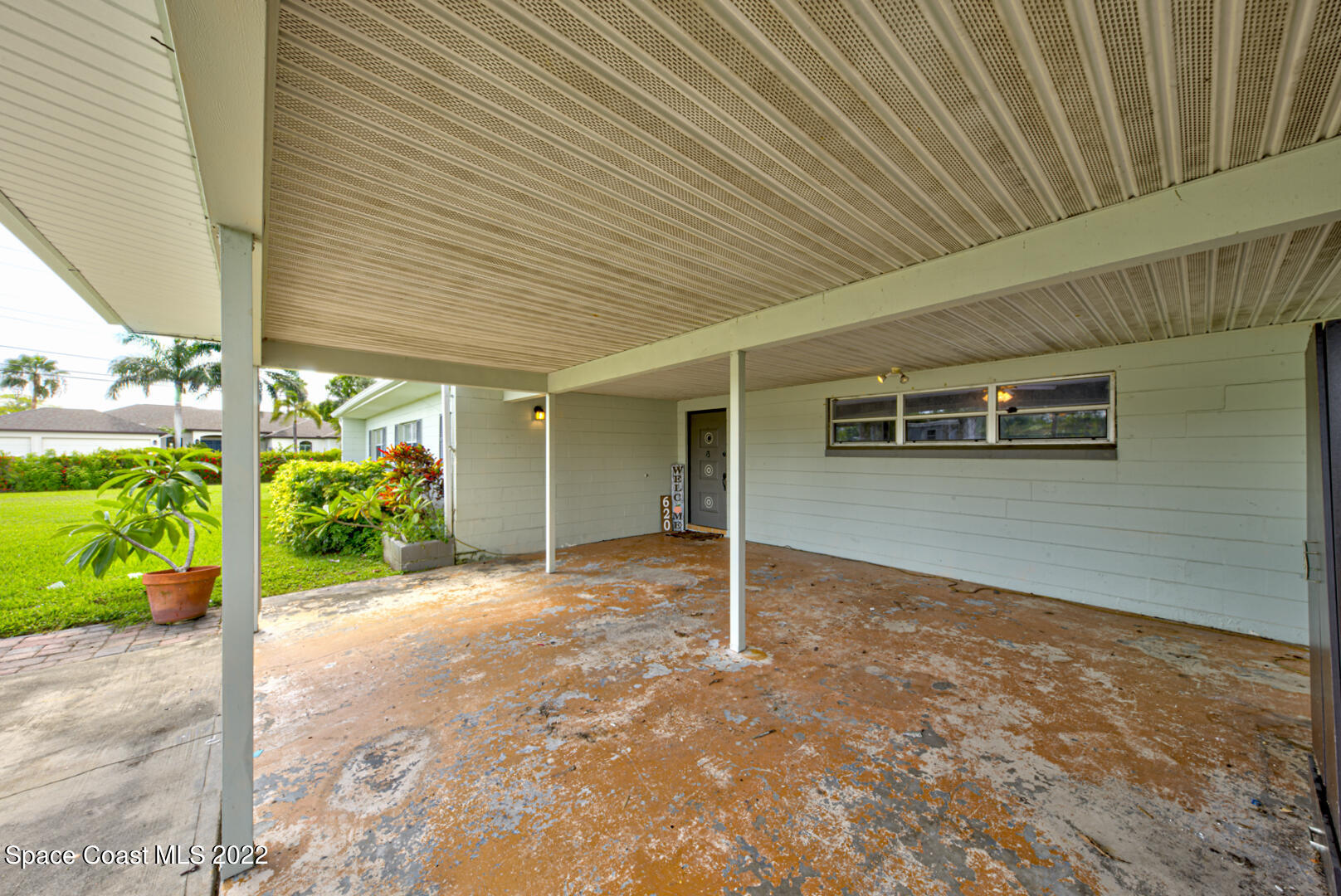 620 Java Road Cocoa Beach, FL 32931 - Photo 4 of 39 a view of a house with backyard and porch