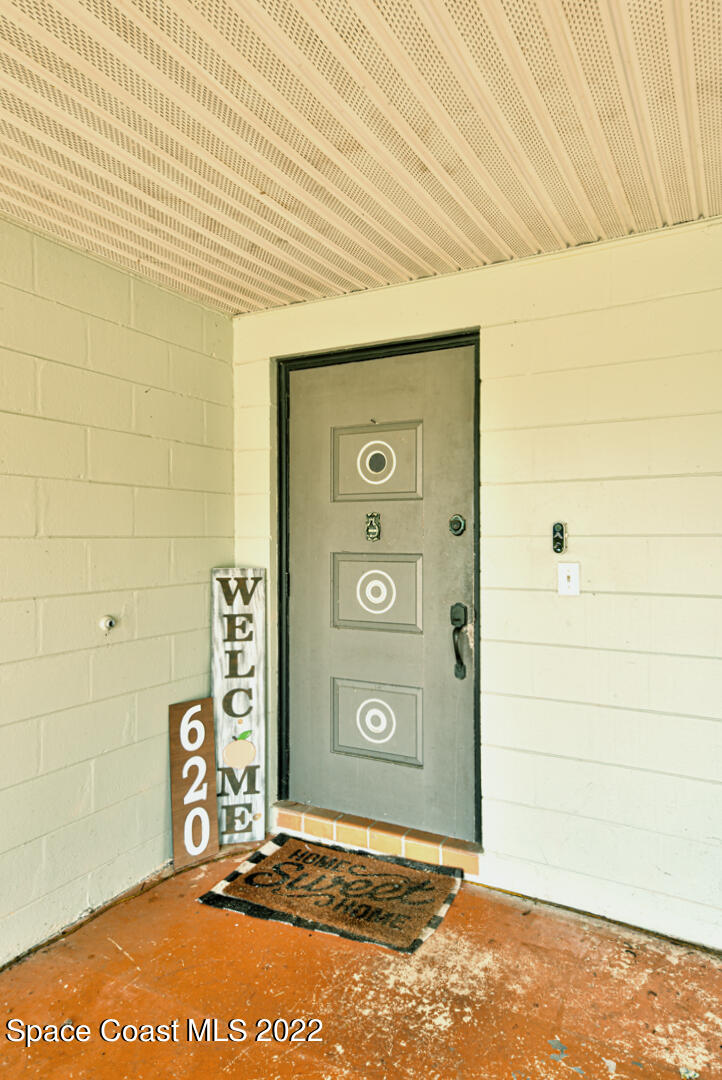 620 Java Road Cocoa Beach, FL 32931 - Photo 5 of 39 a view of a door of the house