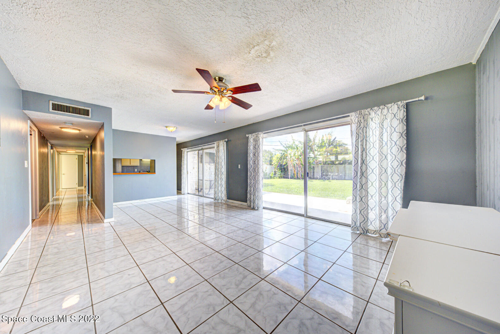 620 Java Road Cocoa Beach, FL 32931 - Photo 7 of 39 a view of an empty room and window