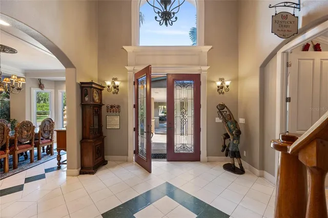 a view of a entryway door with couch