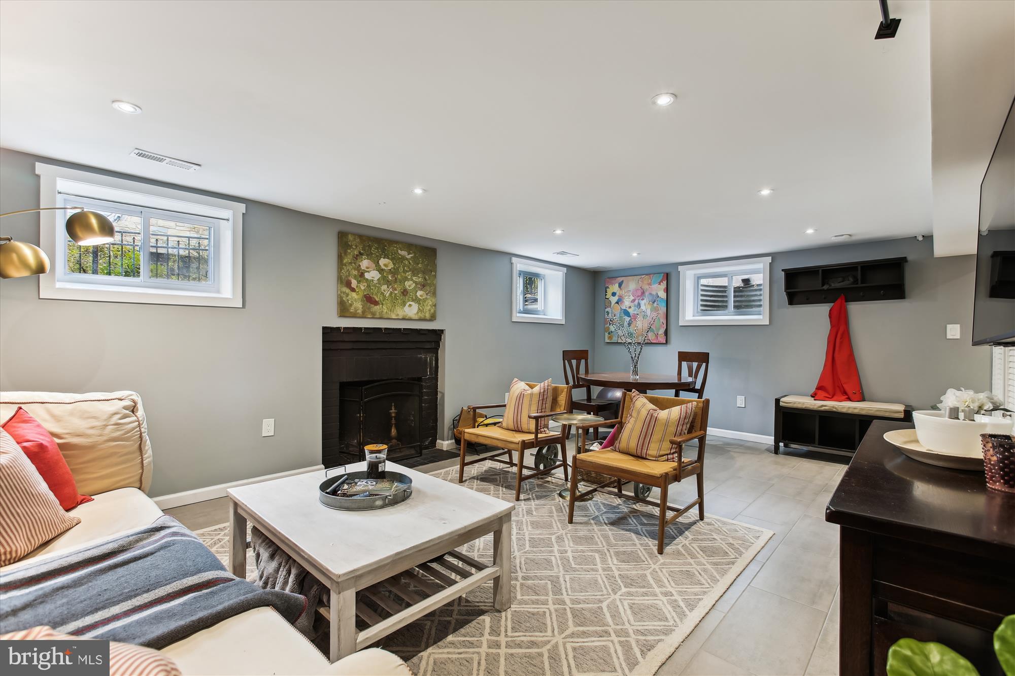 310 Beverley Drive Alexandria, VA 22305 - Photo 23 of 49 Wood burning fireplace, basement Rec room