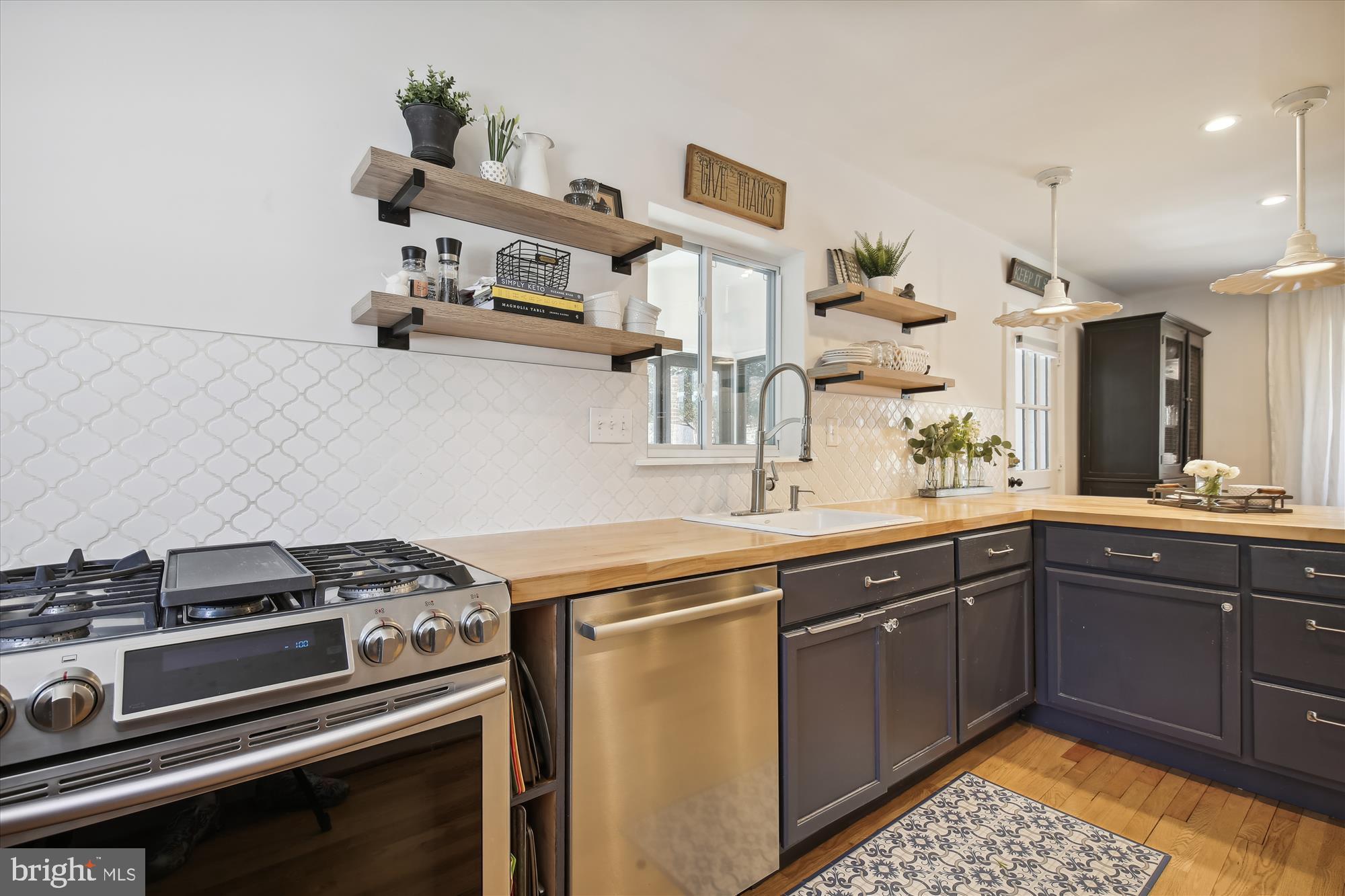 310 Beverley Drive Alexandria, VA 22305 - Photo 7 of 49 Window over the sink looks over sunporch, Park
