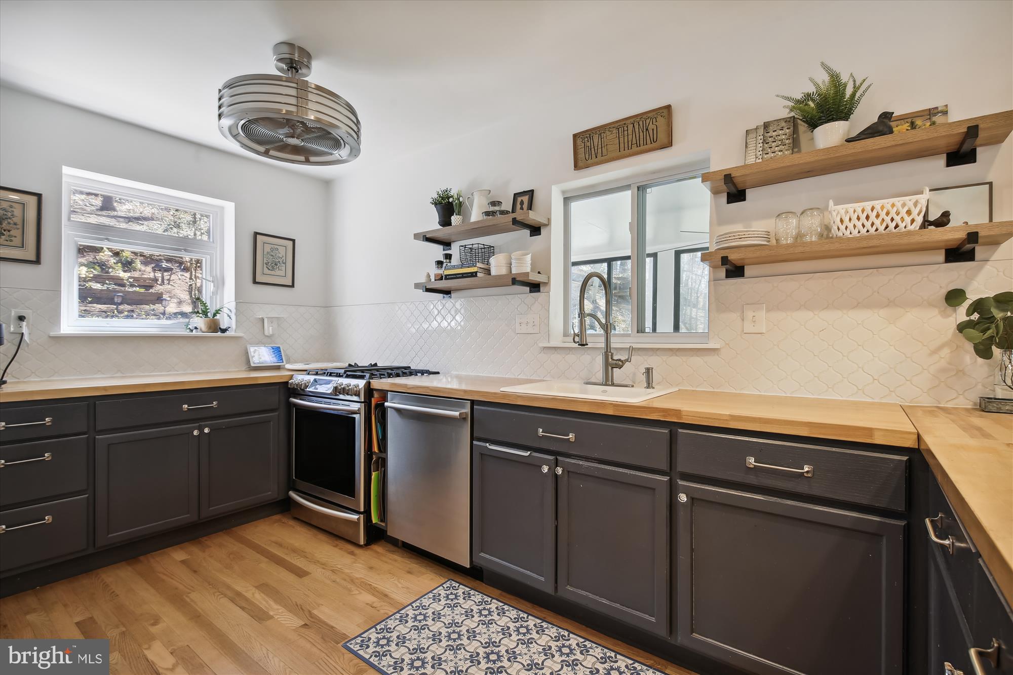 310 Beverley Drive Alexandria, VA 22305 - Photo 8 of 49 Back window looks over brick patio