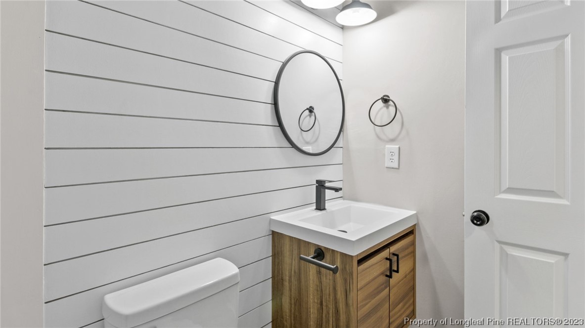 3610 Yorktown Road Hope Mills, NC 28348 - Photo 13 of 22 a bathroom with a sink and a mirror