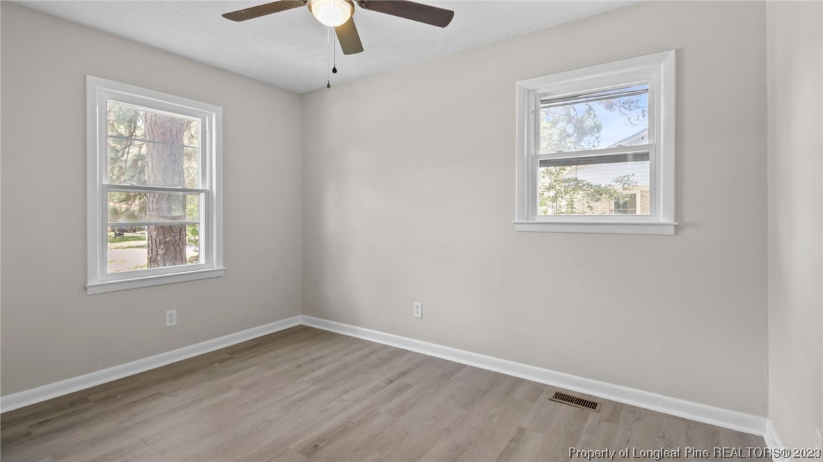 3610 Yorktown Road Hope Mills, NC 28348 - Photo 17 of 22 an empty room with windows and fan