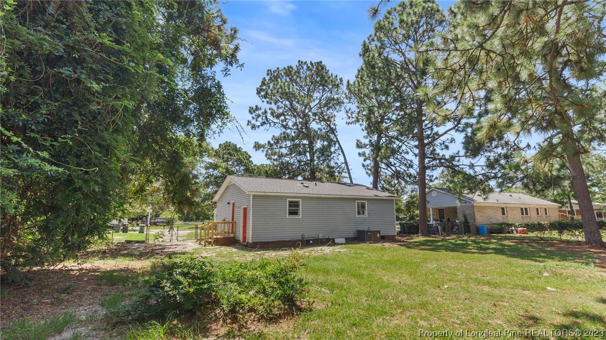3610 Yorktown Road Hope Mills, NC 28348 - Photo 21 of 22 a view of a house with backyard and garden