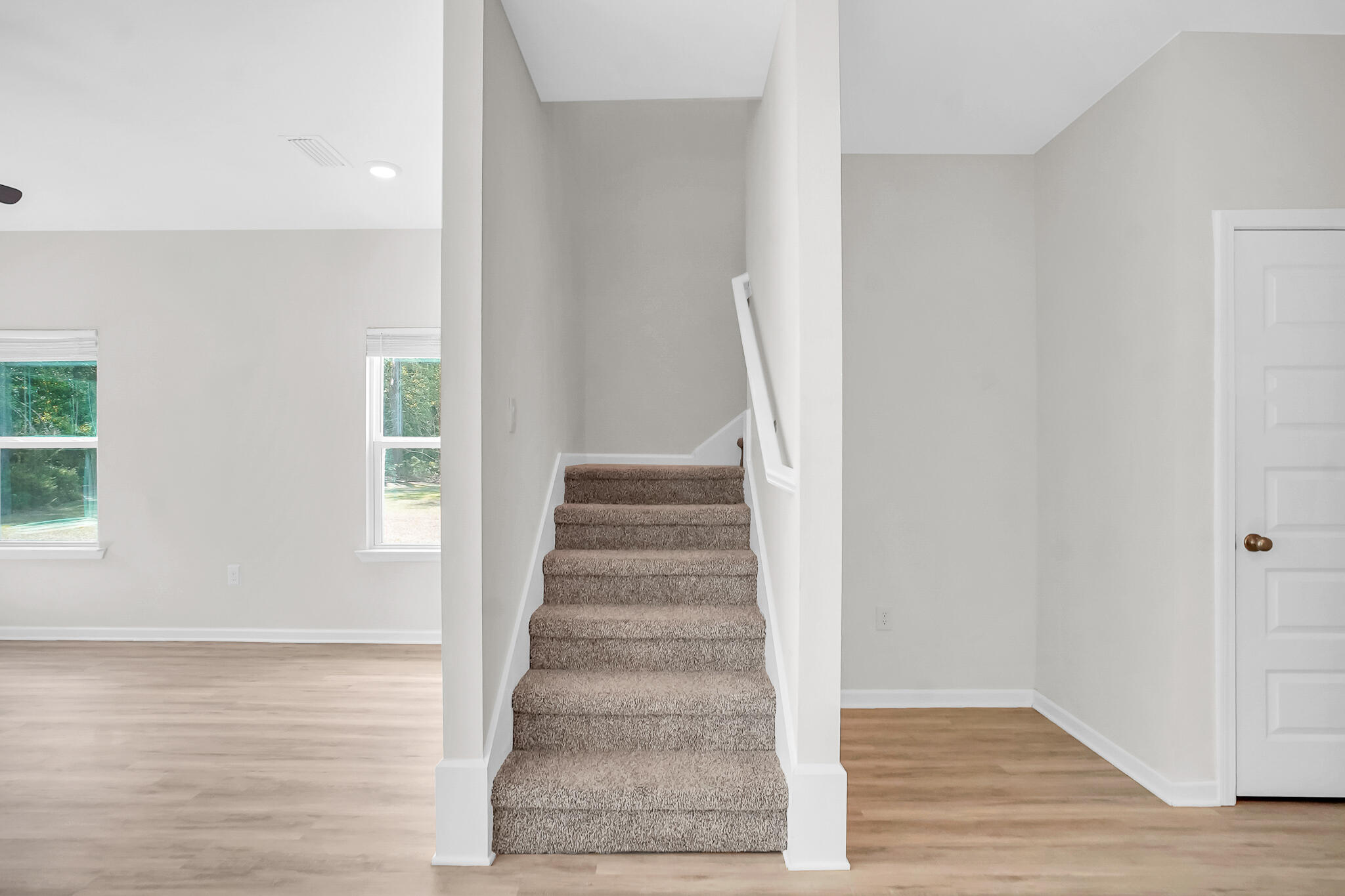 34 Sandywoods Court Freeport, FL 32439 - Photo 15 of 41 a view of an entryway with wooden floor and door