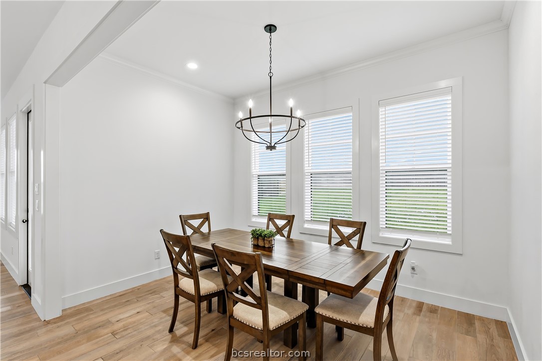 3512 Castine Court Bryan, TX 77808 - Photo 21 of 45 Offset dining room in open concept layout