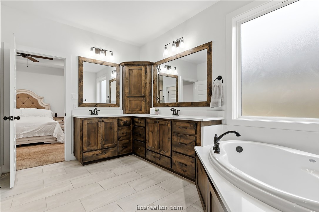 3512 Castine Court Bryan, TX 77808 - Photo 25 of 45 Custom cabinets, ample counter space & garden tub