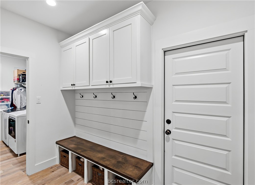 3512 Castine Court Bryan, TX 77808 - Photo 28 of 45 mud room inside the garage entry