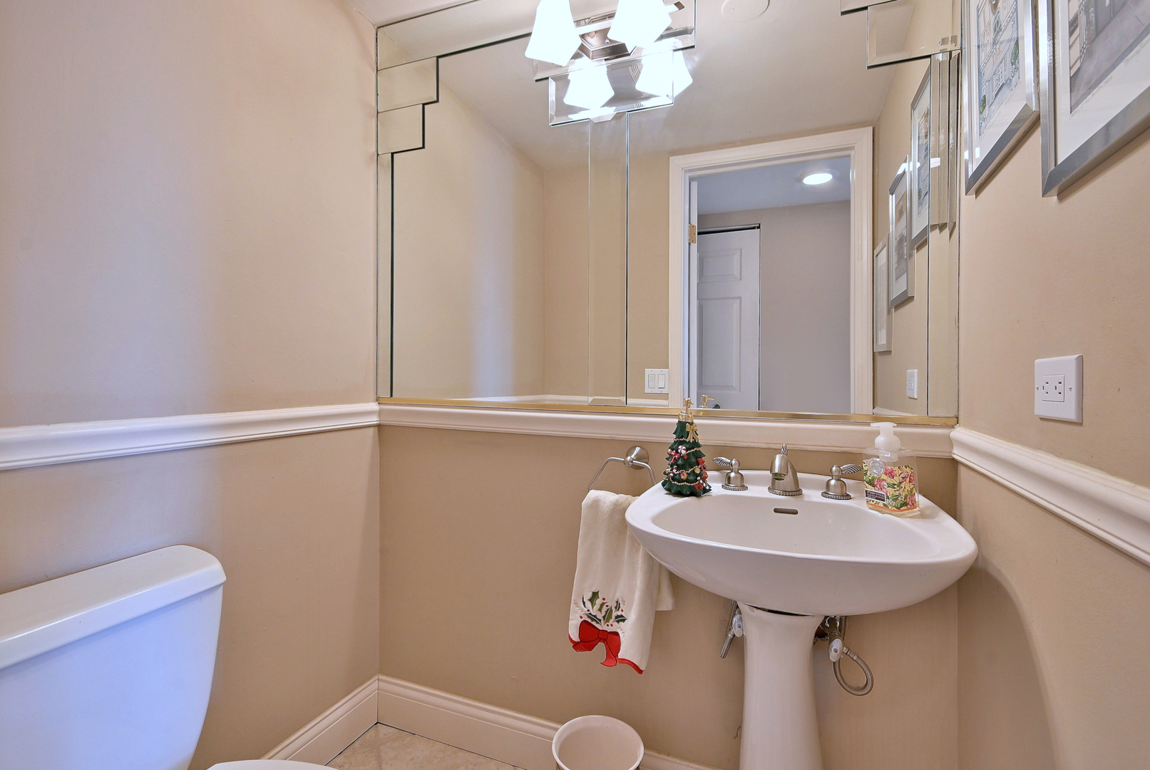 7 Birch Tree Court Elmhurst, IL 60126 - Photo 12 of 31 a bathroom with a sink toilet and a mirror