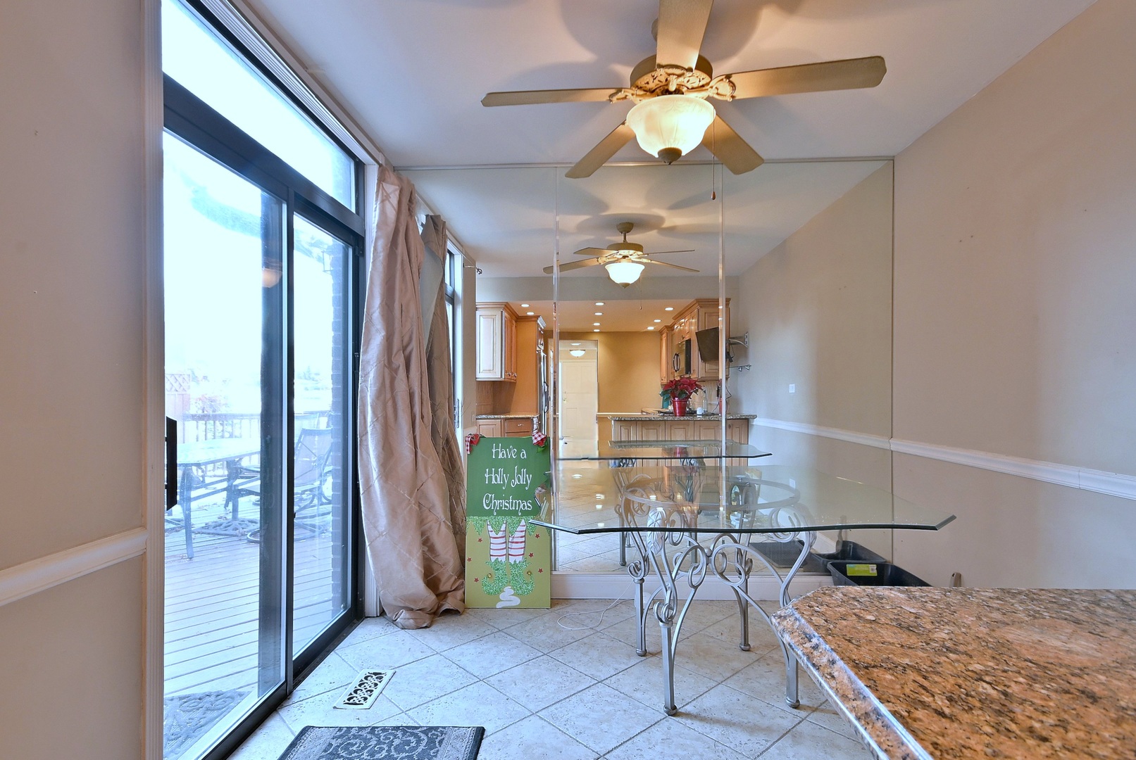 7 Birch Tree Court Elmhurst, IL 60126 - Photo 16 of 31 a view of a livingroom with furniture and a ceiling fan