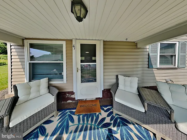 a outdoor living space with patio furniture