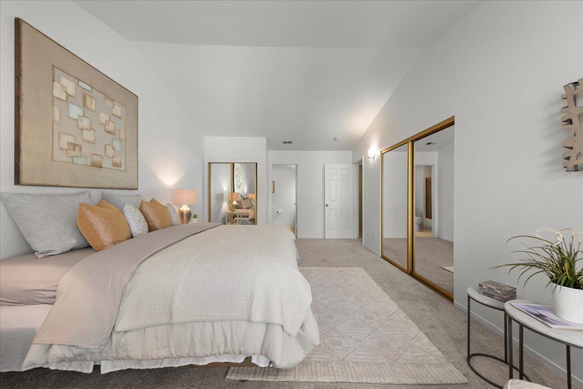 2392 North Main Street, Unit E Salinas, CA 93906 - Photo 19 of 27 a large white bed in a white room