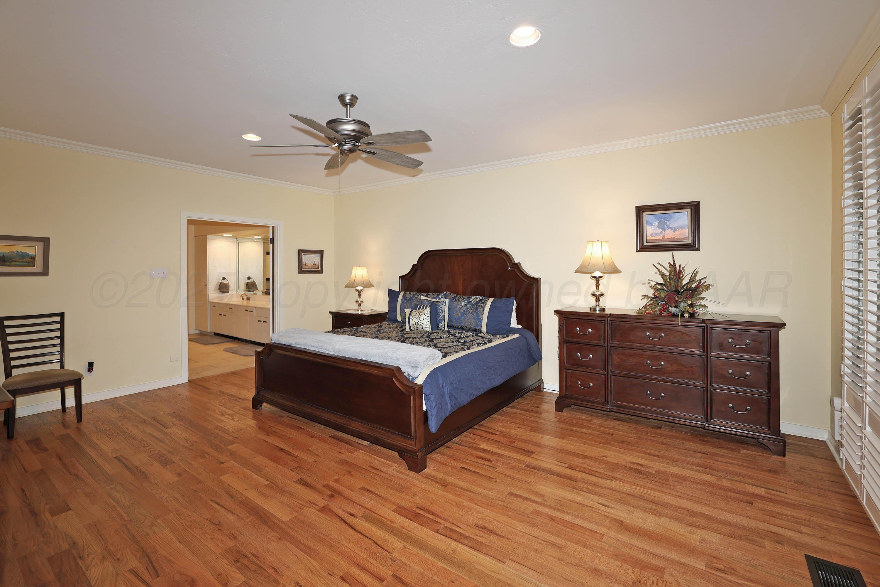 3 Woodstone Street Amarillo, TX 79106 - Photo 21 of 44 a living room with furniture and wooden floor