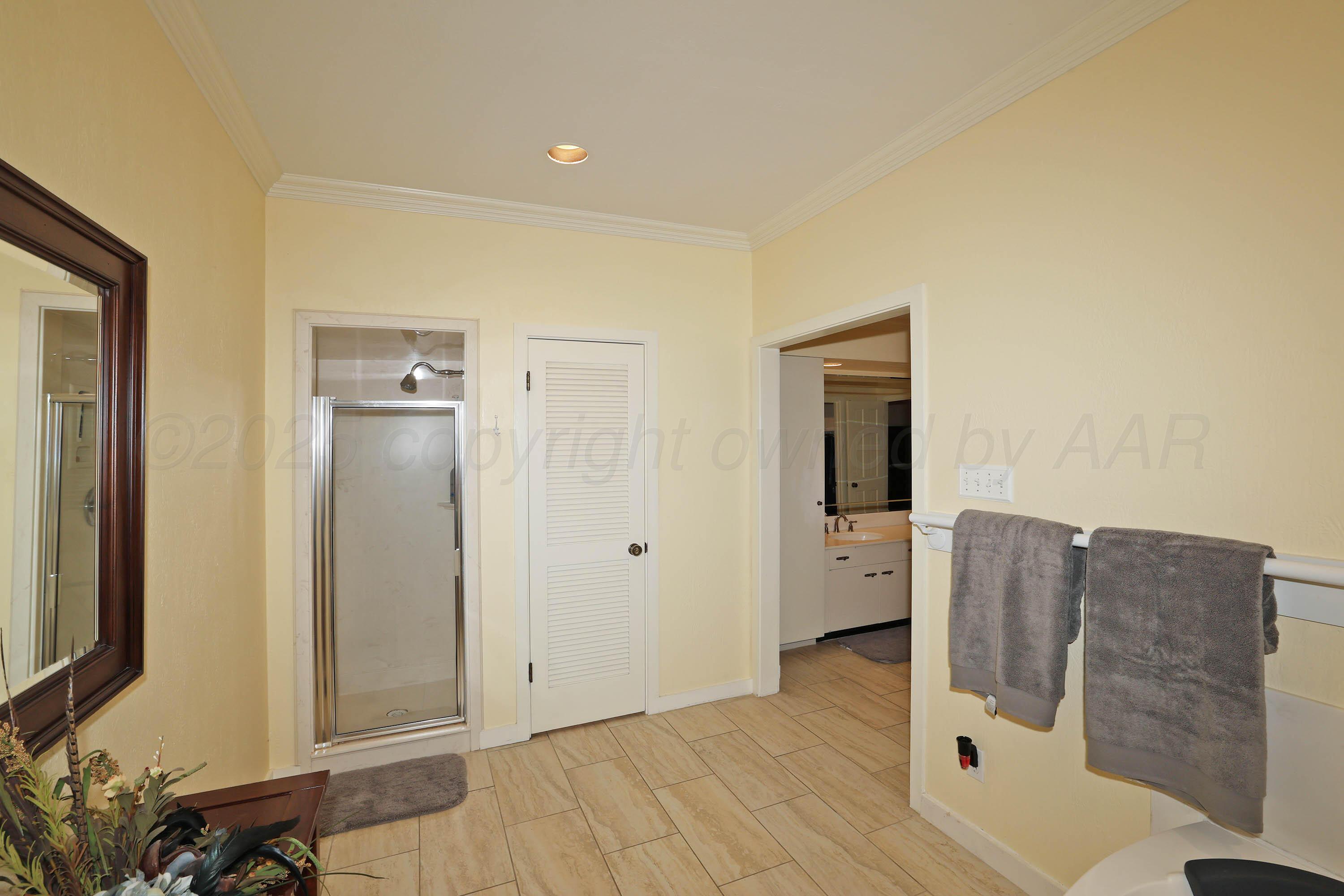 3 Woodstone Street Amarillo, TX 79106 - Photo 26 of 44 a room with furniture and a wooden floor