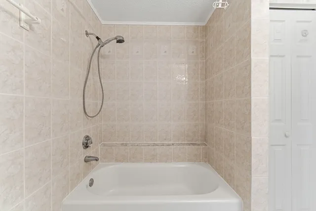 a close up of a bathtub in a bathroom