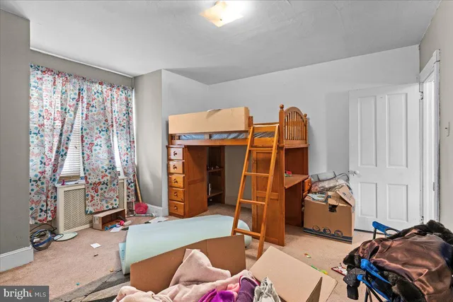 a room with furniture and a wooden floor