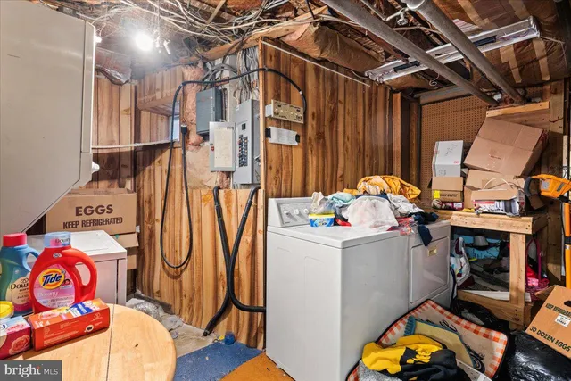 a bathroom with a bath tub a sink and a shower