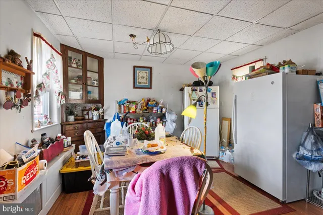 a view of a room with workspace and toys