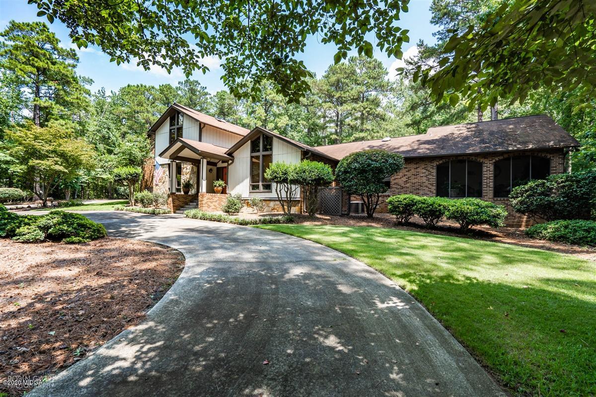 1225 Bass Road Macon, GA 31210 - Photo 2 of 58 a front view of a house with a yard