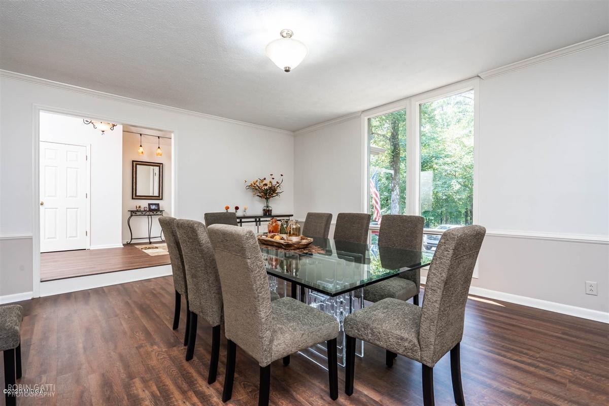 1225 Bass Road Macon, GA 31210 - Photo 18 of 58 a dining room with furniture window wooden floor