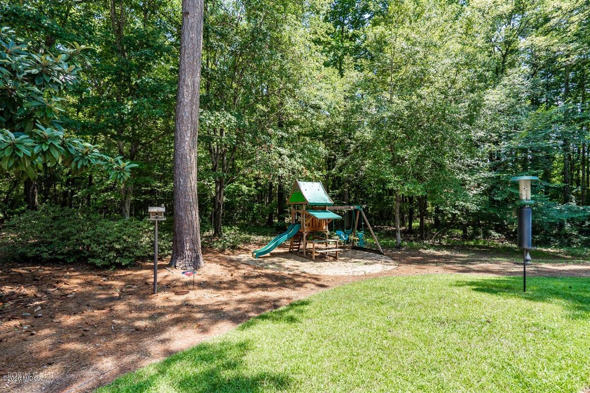 1225 Bass Road Macon, GA 31210 - Photo 57 of 58 a view of outdoor space with sink and trees
