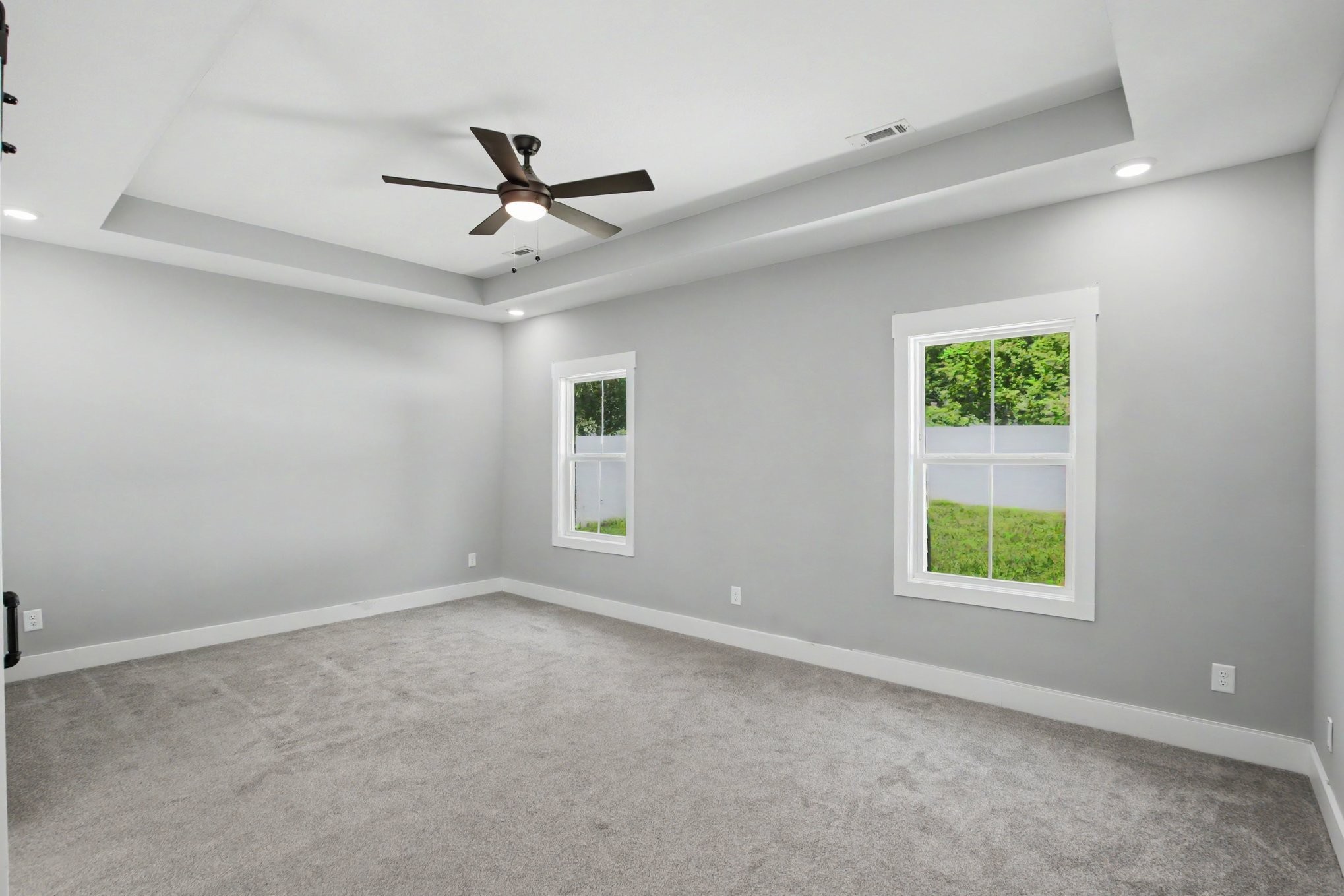 7208 Winding Way Pleasant View, TN 37146 - Photo 15 of 30 an empty room with windows and fan