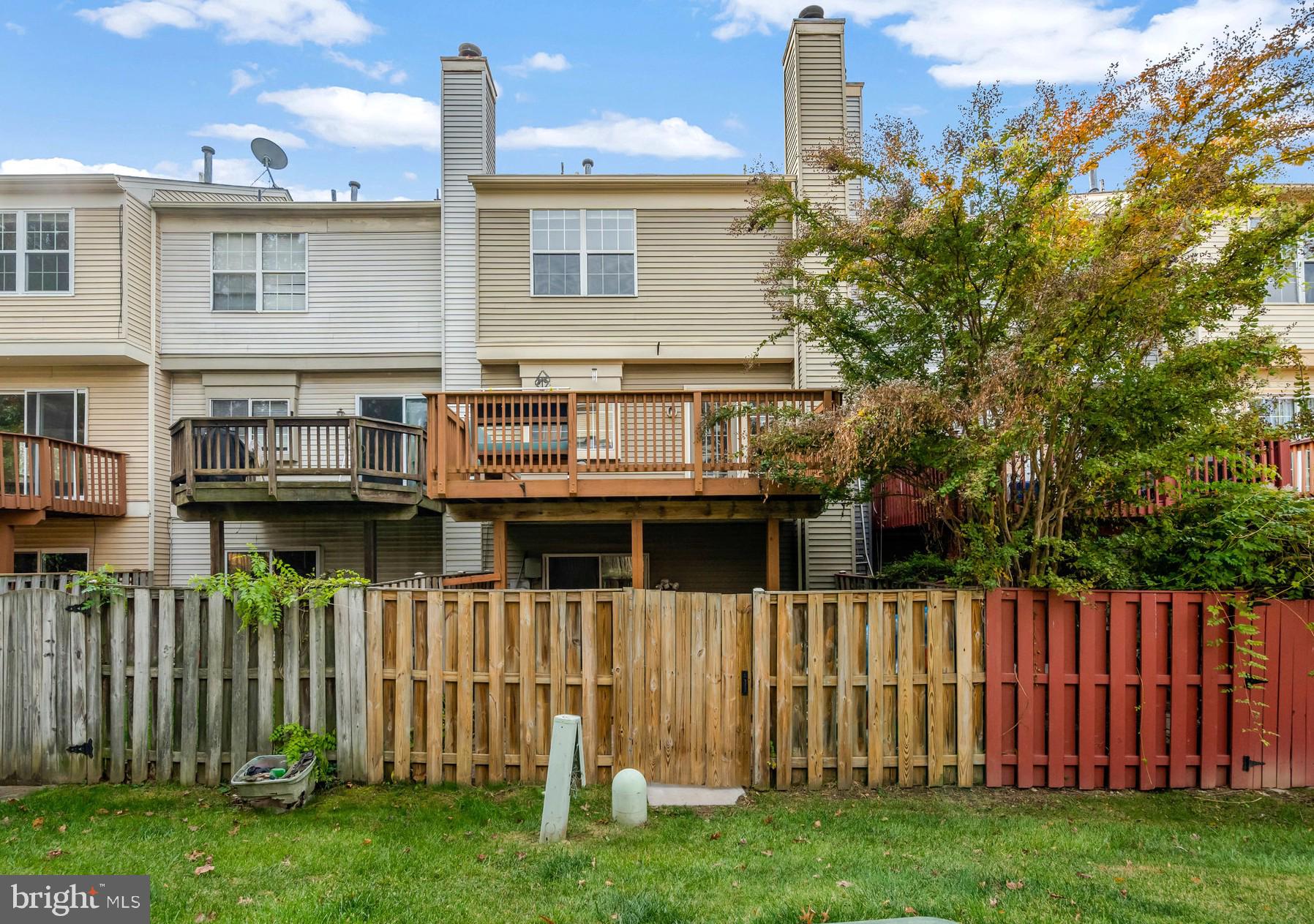 7905 Rebel Walk Drive Manassas, VA 20109 - Photo 48 of 51 a front view of a house with a garden
