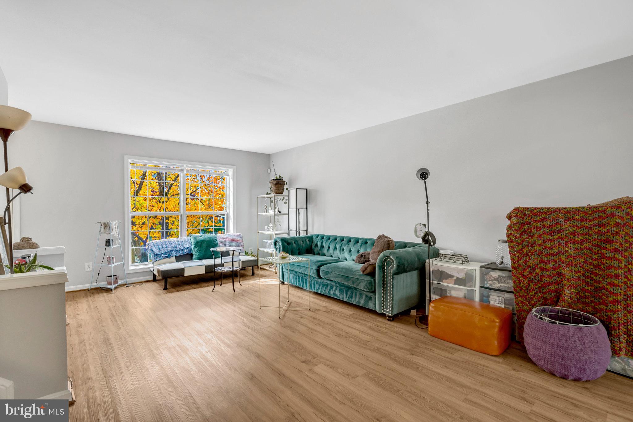 7905 Rebel Walk Drive Manassas, VA 20109 - Photo 9 of 51 a living room with furniture window and wooden floor
