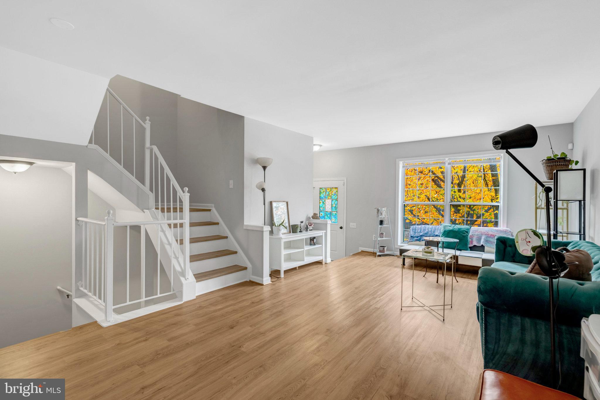 7905 Rebel Walk Drive Manassas, VA 20109 - Photo 10 of 51 a living room with furniture and a large window