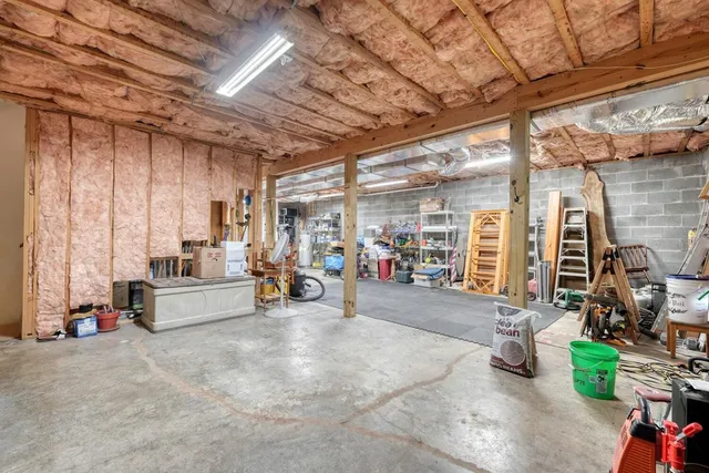 a balcony with wooden floor and fence