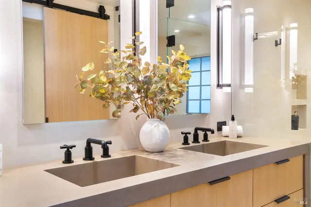 a bedroom with a bed and a couch