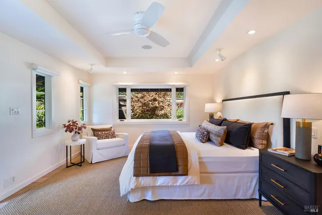 a living room with furniture or window and a chandelier