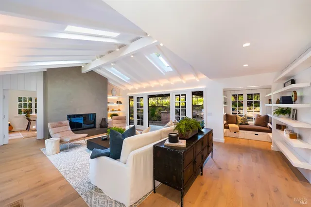 a living room with furniture and window