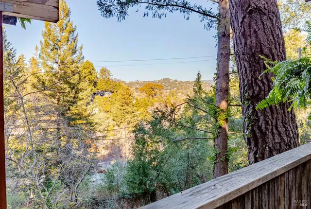 a view of a yard from a balcony