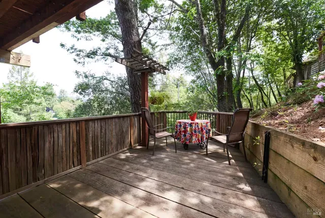 a view of hallway with wooden floor