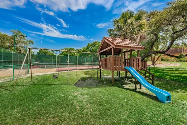 a view of a garden with a slide