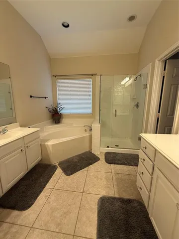 a bathroom with a sink a toilet and a bathtub