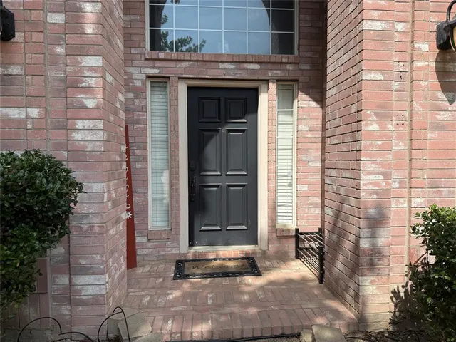 a front view of a house with a door