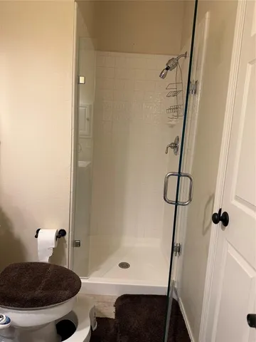 a bathroom with a sink and a shower