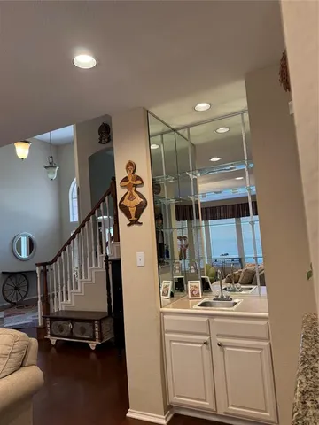 a view of a patio with table and chairs