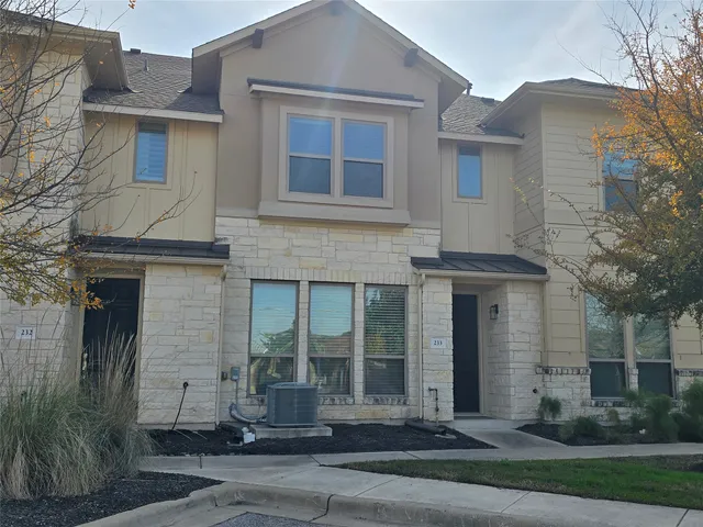 a view of a building with a street