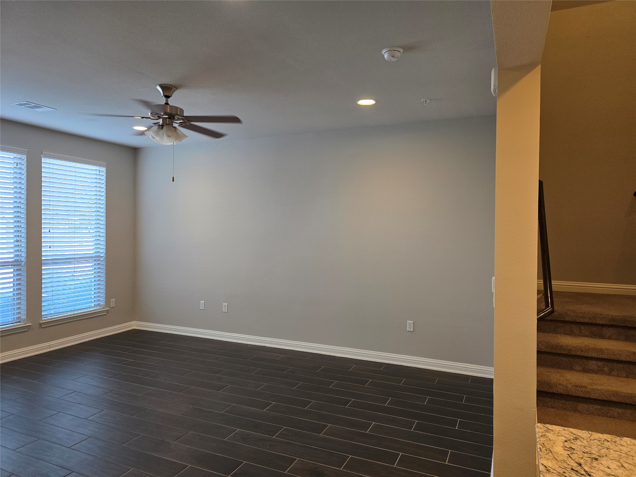 13800 Lyndhurst Street, Unit 233 Austin, TX 78717 - Photo 11 of 38 wooden floor in an empty room with a window