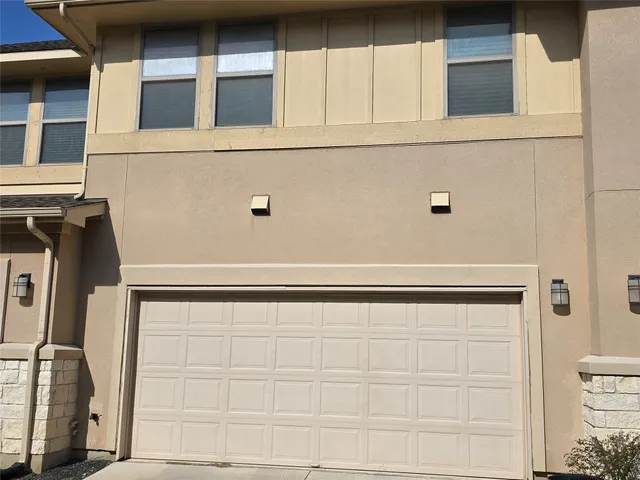 a wall with a sign on it